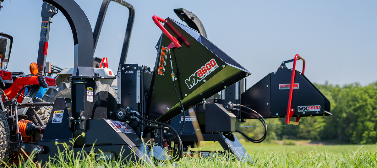 PTO wood chipper attached to tractor for horsepower selection guide