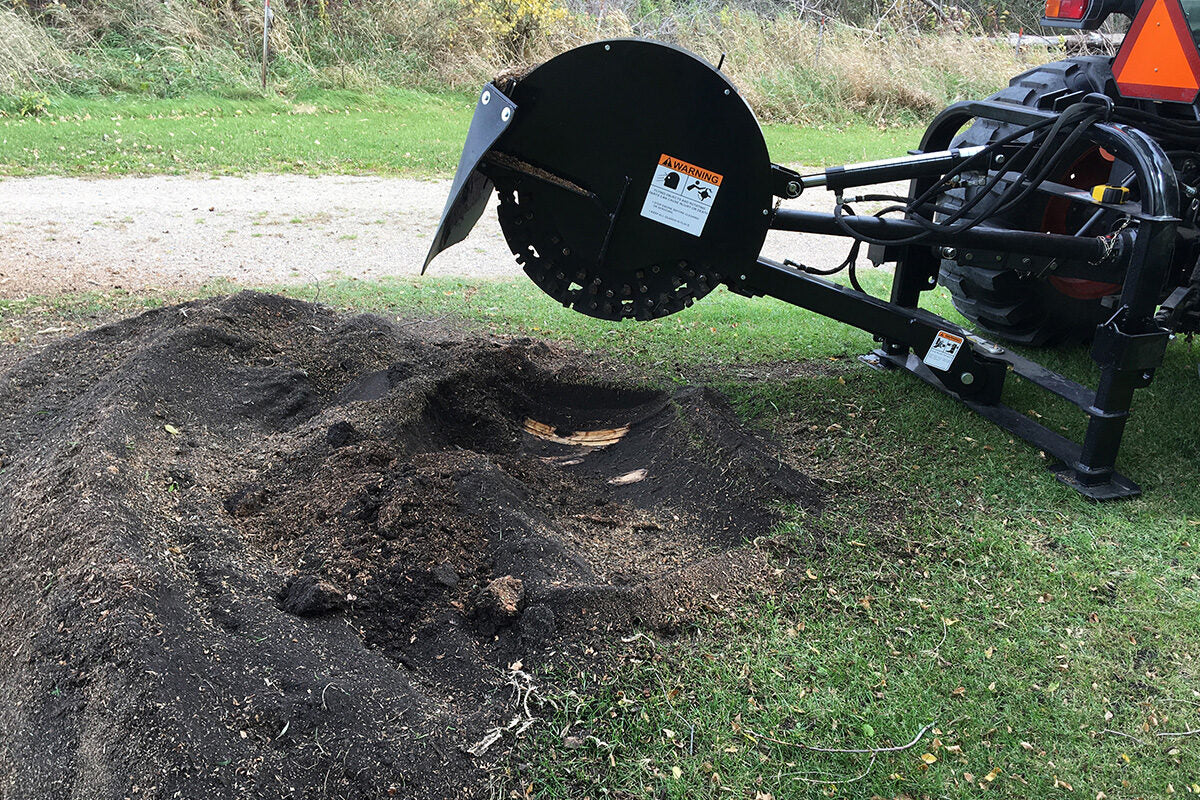Erskine 34-inch PTO stump grinder in use